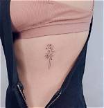 Exquisite Rib Flower Tattoo Designs: a Timeless Symbol of Beauty
